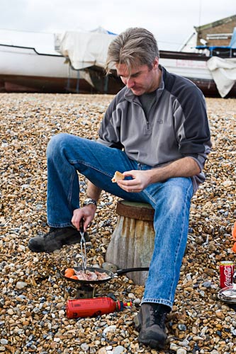 Daddy cooks on the beach at Eastbourne